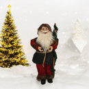 Dekofigur Weihnachtsmann mit Rute und Kostüm in festlichen Farben